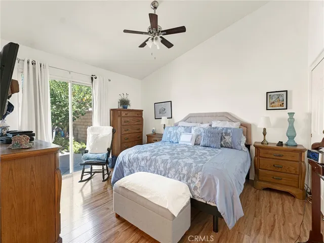 a bedroom with a bed and a couch