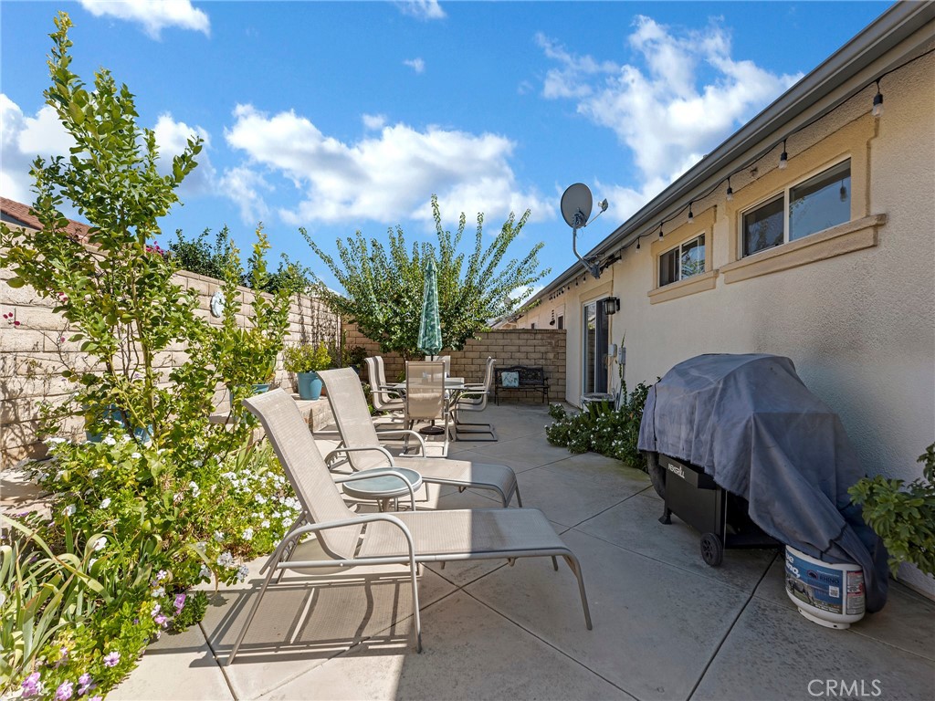 5621 Daisy Street Simi Valley, CA 93063 - Photo 25 of 31 a view of a patio with furniture and a potted plant