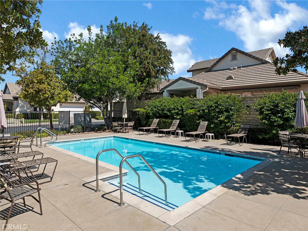 5621 Daisy Street Simi Valley, CA 93063 - Photo 30 of 31 a view of a house with sitting area and swimming pool