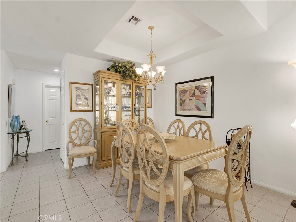 5621 Daisy Street Simi Valley, CA 93063 - Photo 9 of 31 a view of a dining room with furniture and chandelier