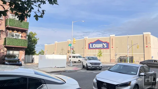 a view of city from balcony with seating space