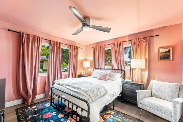 a bedroom with a bed and a couch