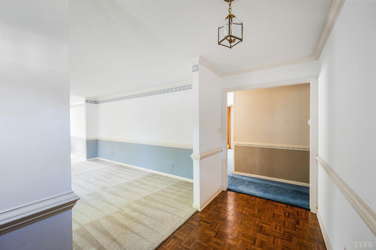 101 Foxhall Drive Forest, VA 24551 - Photo 15 of 54 an entryway with wooden floor and cabinet