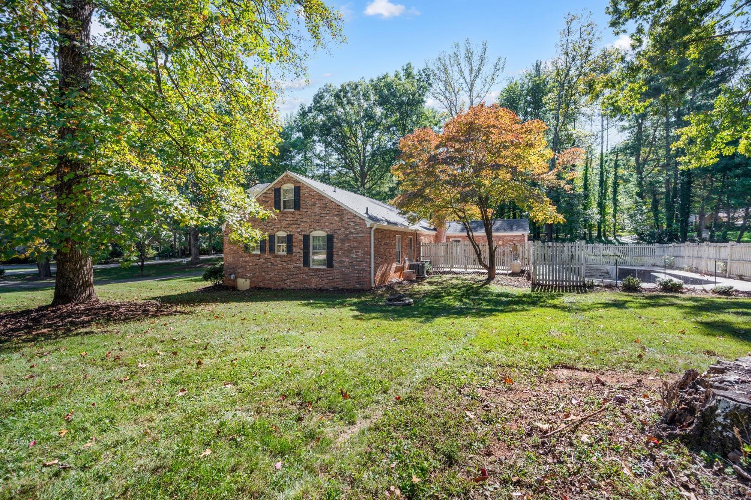 101 Foxhall Drive Forest, VA 24551 - Photo 4 of 54 a front view of a house with garden