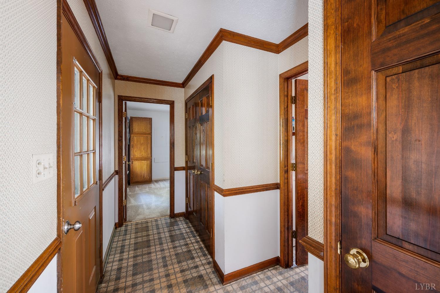 101 Foxhall Drive Forest, VA 24551 - Photo 47 of 54 a view of a hallway with a door and couch