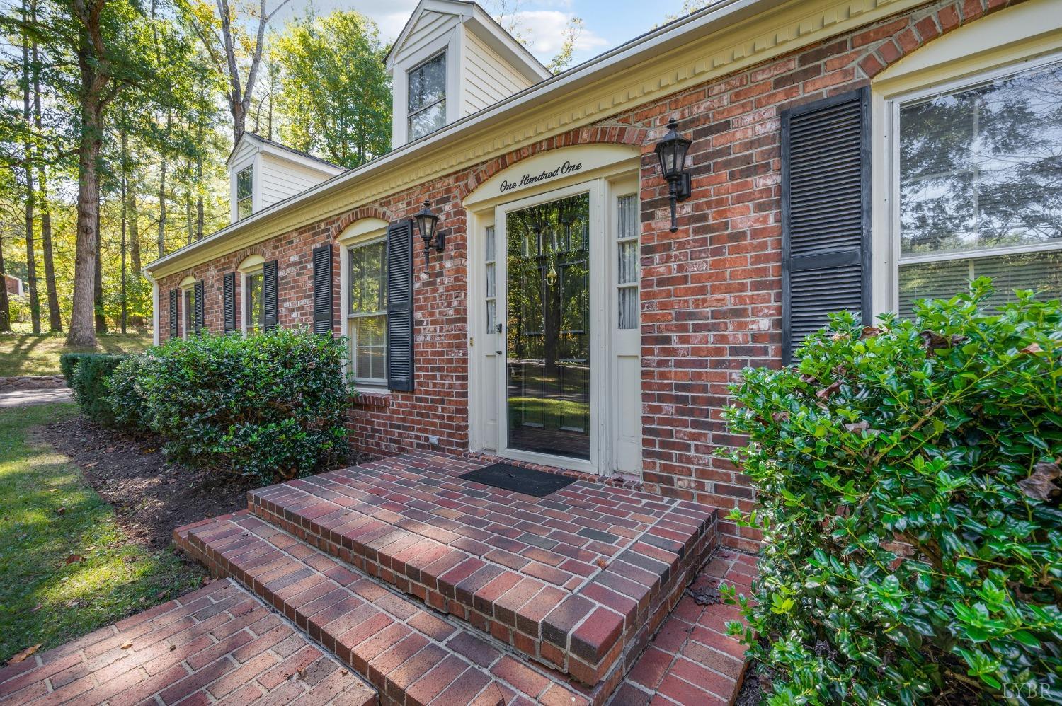 101 Foxhall Drive Forest, VA 24551 - Photo 6 of 54 a front view of a house with garden