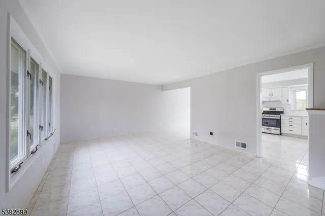 a view of an empty room with window