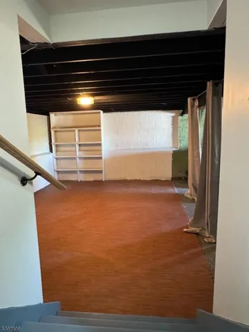 a view of a house with a yard porch and sitting area