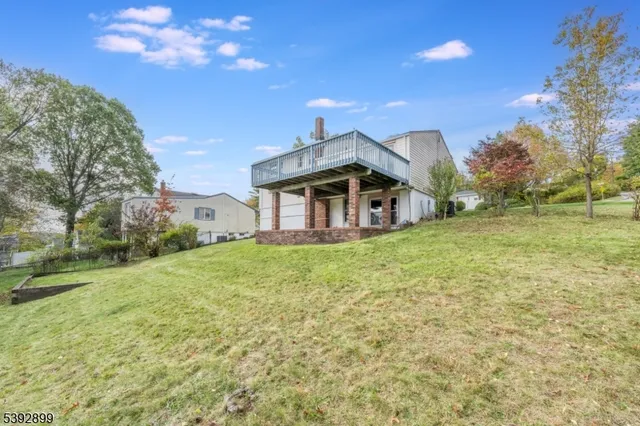 a view of houses with yard