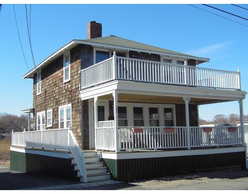 124 Turner Road Scituate, MA 02066 - Photo 1 of 7 a view of a house with a deck