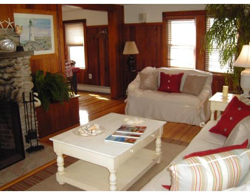 124 Turner Road Scituate, MA 02066 - Photo 2 of 7 a living room with furniture and a large window