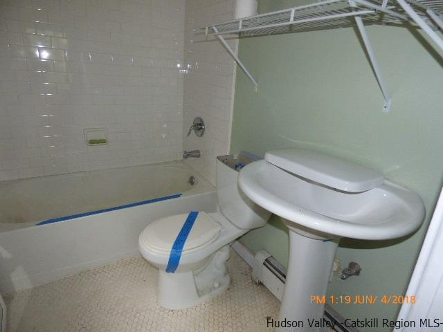 111 Patch Road Saugerties, NY 12477 - Photo 17 of 21 a bathroom with a toilet and a bathtub