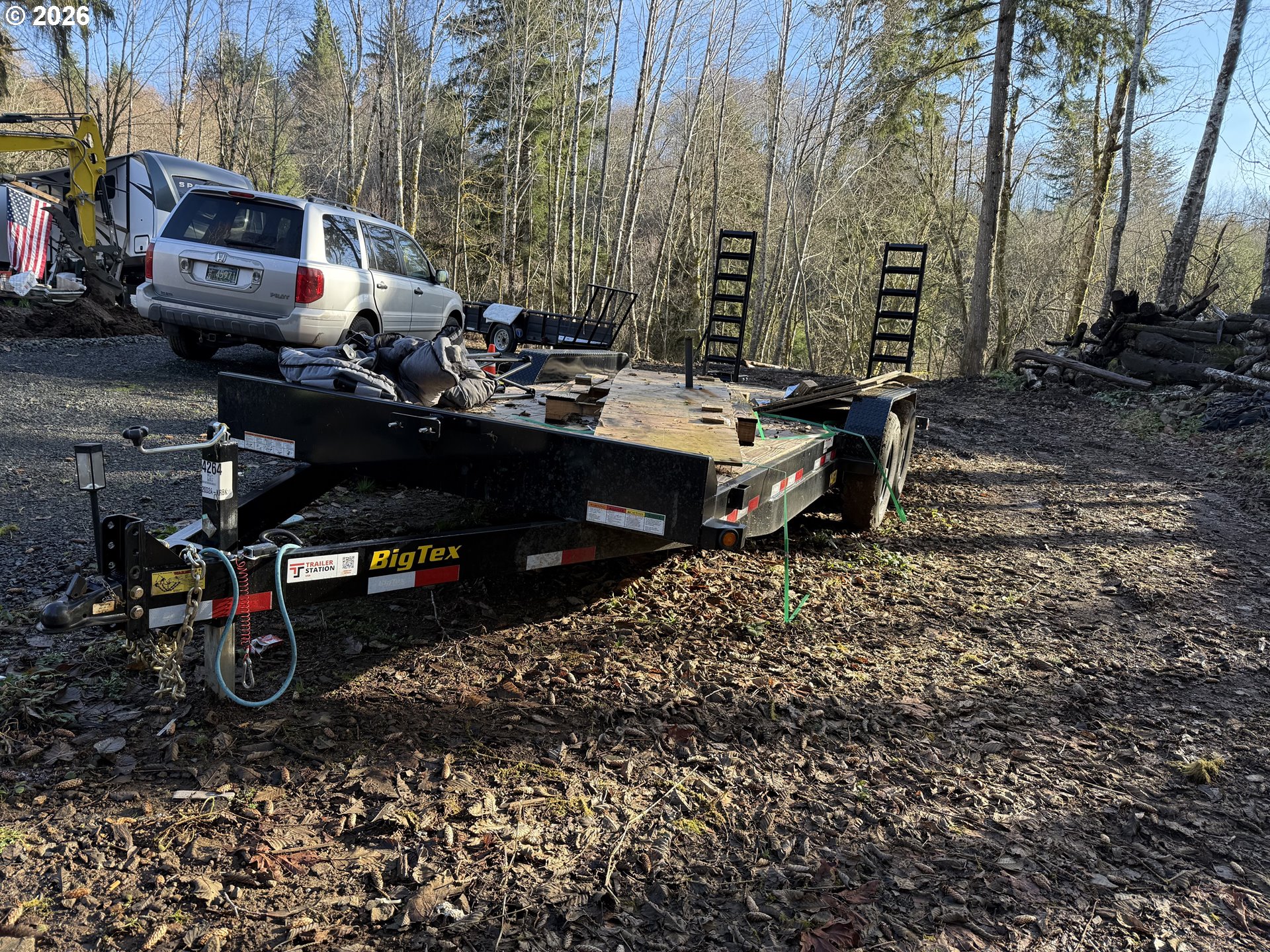 81739 Christmas Tree Road Seaside, OR 97138 - Photo 26 of 29 a backyard of a house with table and chairs