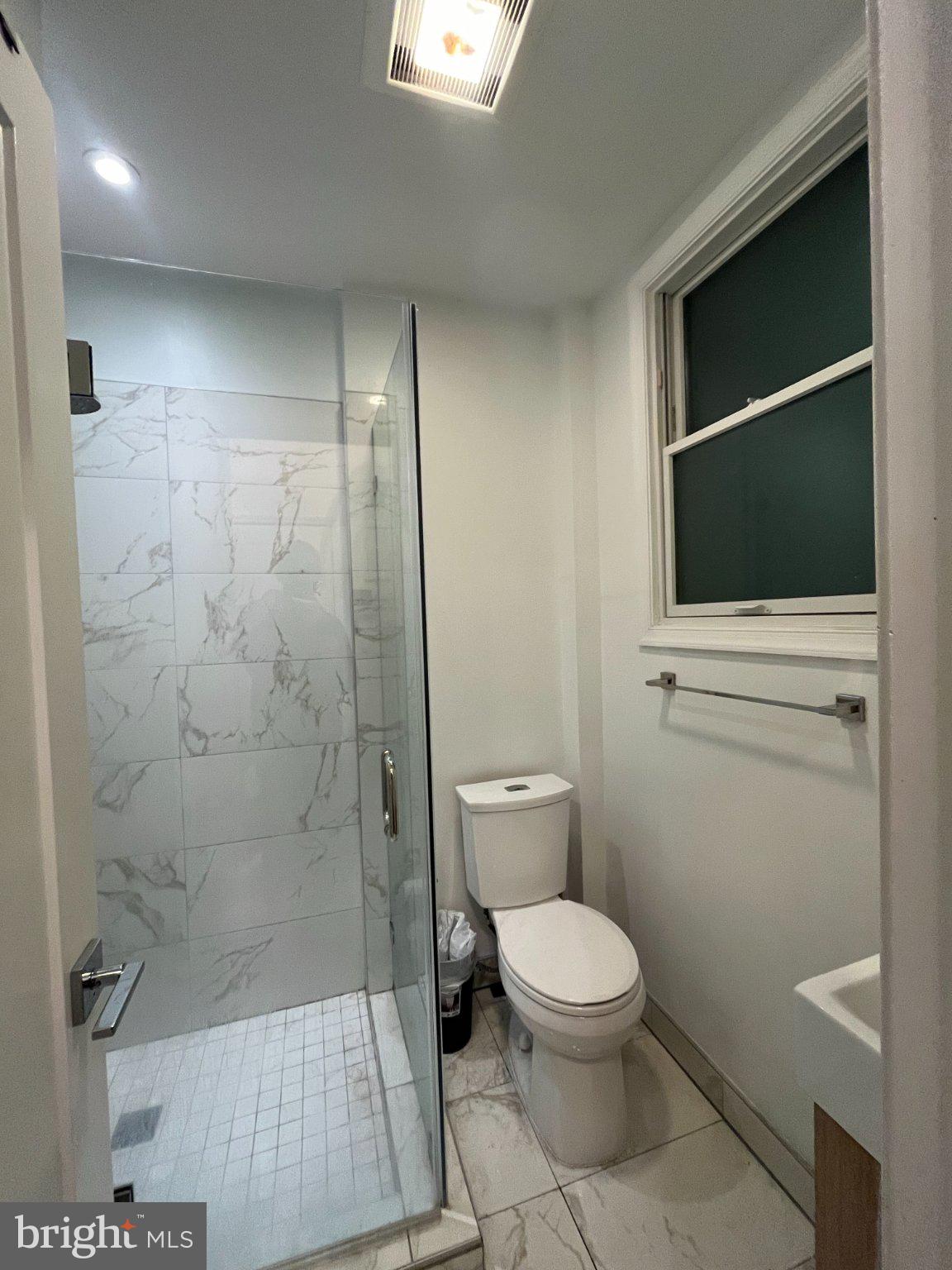 3003 P Street Northwest Washington, DC 20007 - Photo 5 of 7 Modern bathroom with sleek design.