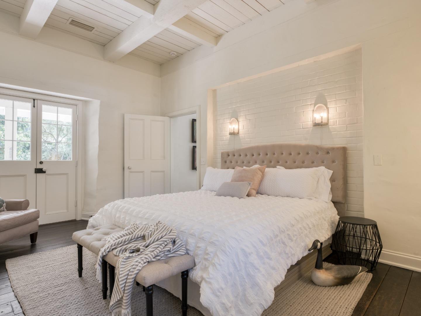 150 Littlefield Road Monterey, CA 93940 - Photo 13 of 51 a bedroom with a bed and a table