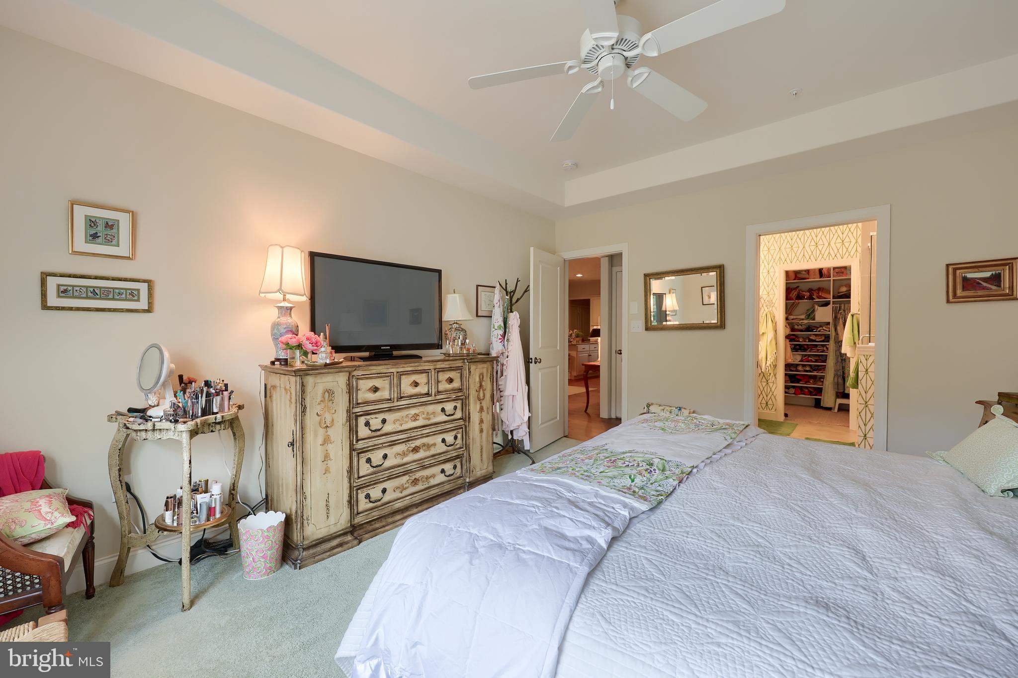 607 Blue Spruce Drive Lititz, PA 17543 - Photo 21 of 34 a bedroom with a bed and a flat screen tv