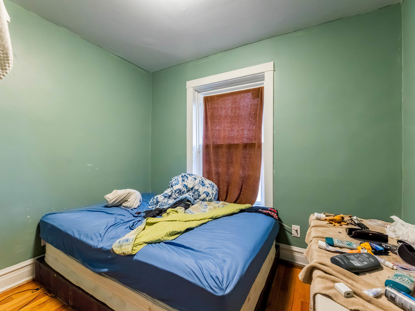 4747 West Monroe Street Chicago, IL 60644 - Photo 15 of 25 a bedroom with a bed and a window
