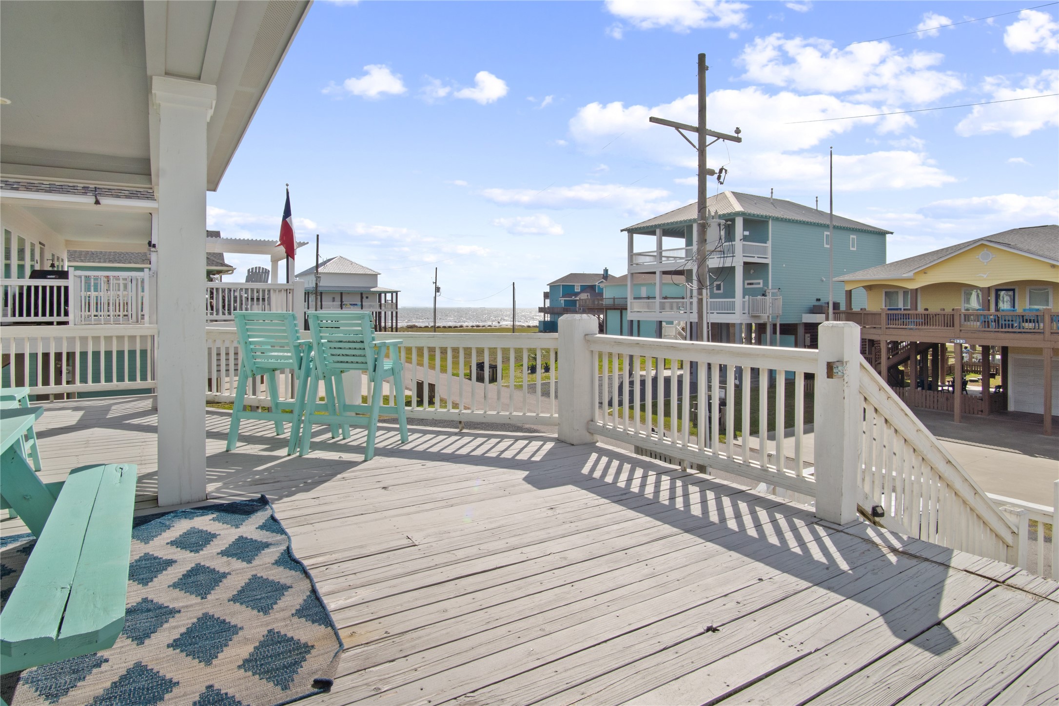 932 Kent Crystal Beach, TX 77650 - Photo 1 of 37 a view of a balcony with wooden floor