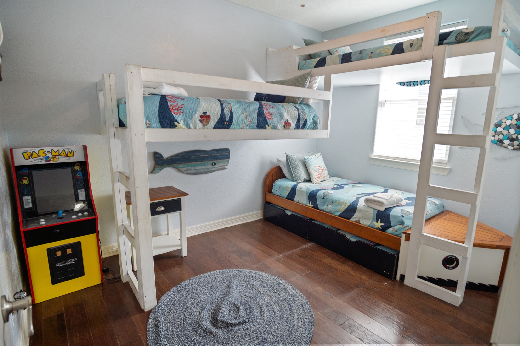 932 Kent Crystal Beach, TX 77650 - Photo 13 of 37 a living room with furniture and a flat screen tv