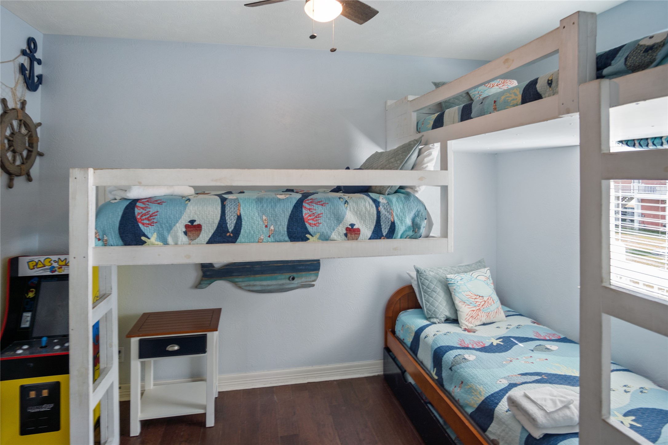 932 Kent Crystal Beach, TX 77650 - Photo 14 of 37 a bedroom with a bed and a window