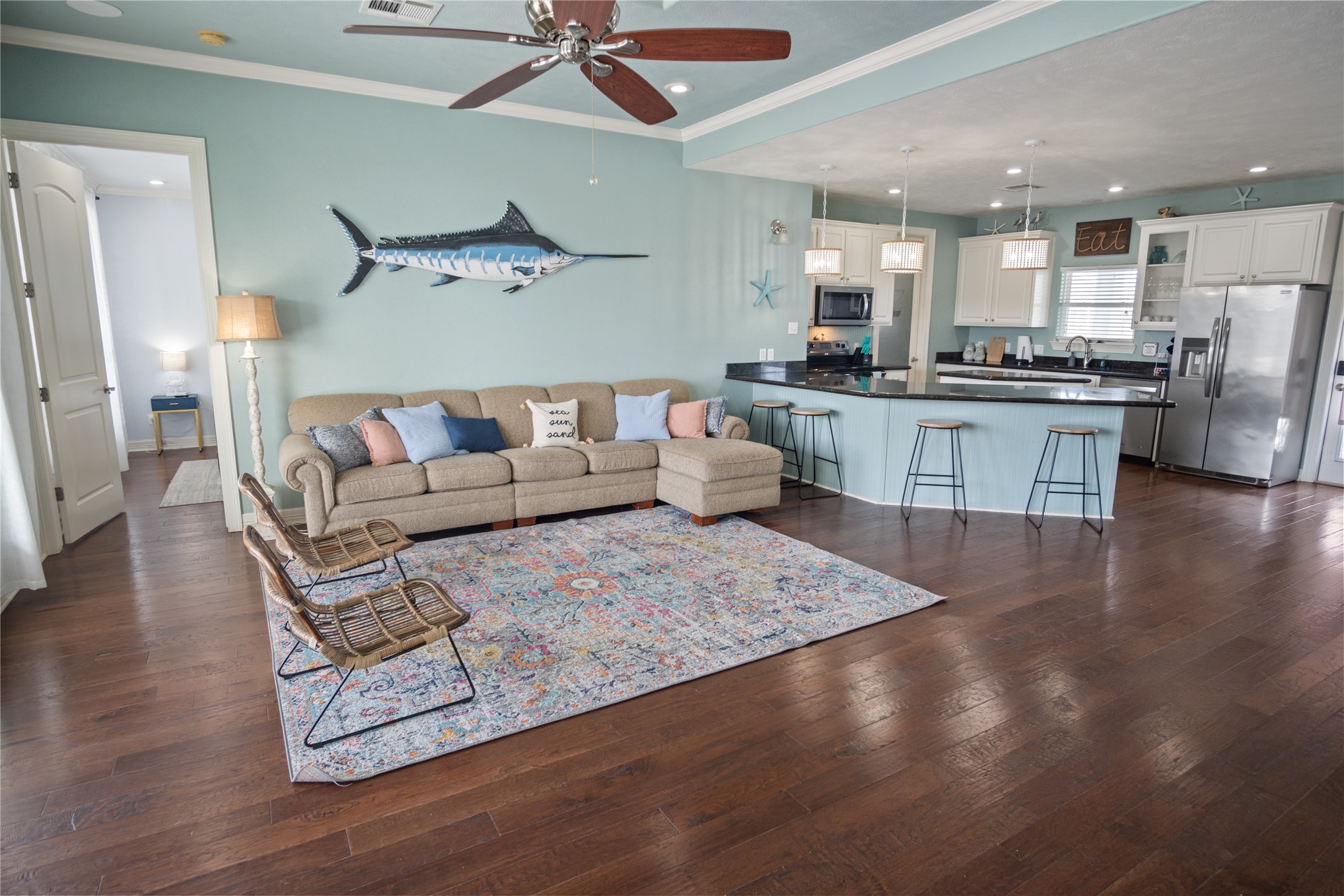 932 Kent Crystal Beach, TX 77650 - Photo 2 of 37 a living room with furniture and kitchen view