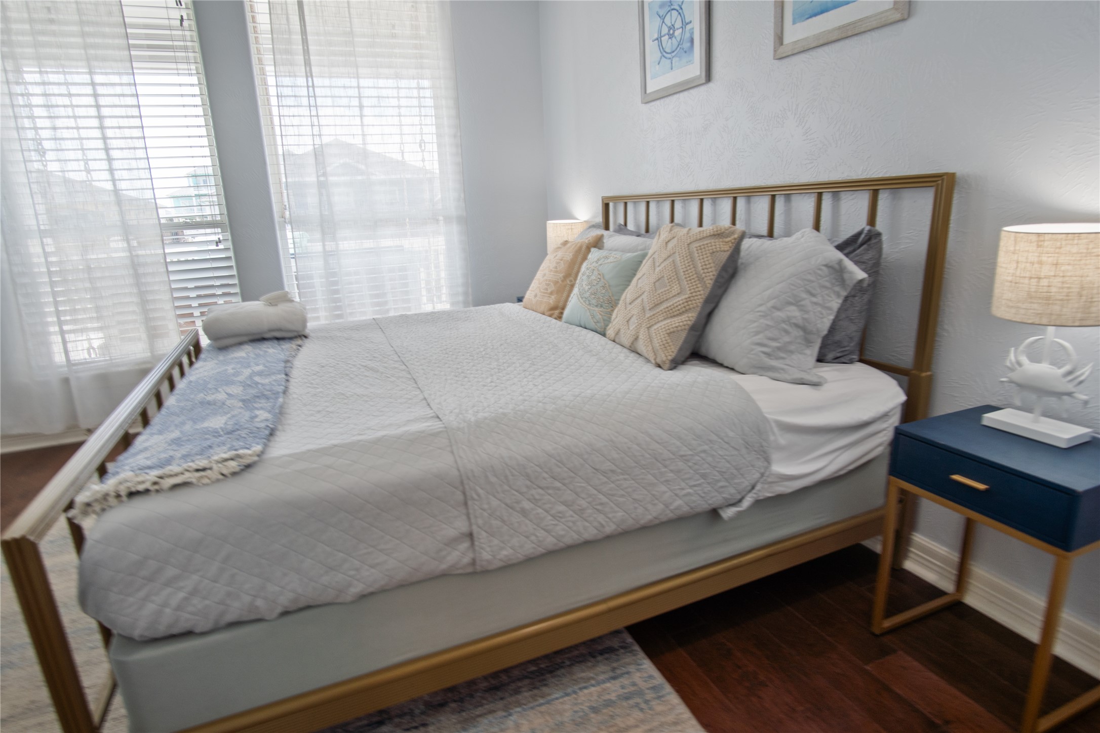 932 Kent Crystal Beach, TX 77650 - Photo 27 of 37 a bedroom with a bed and window