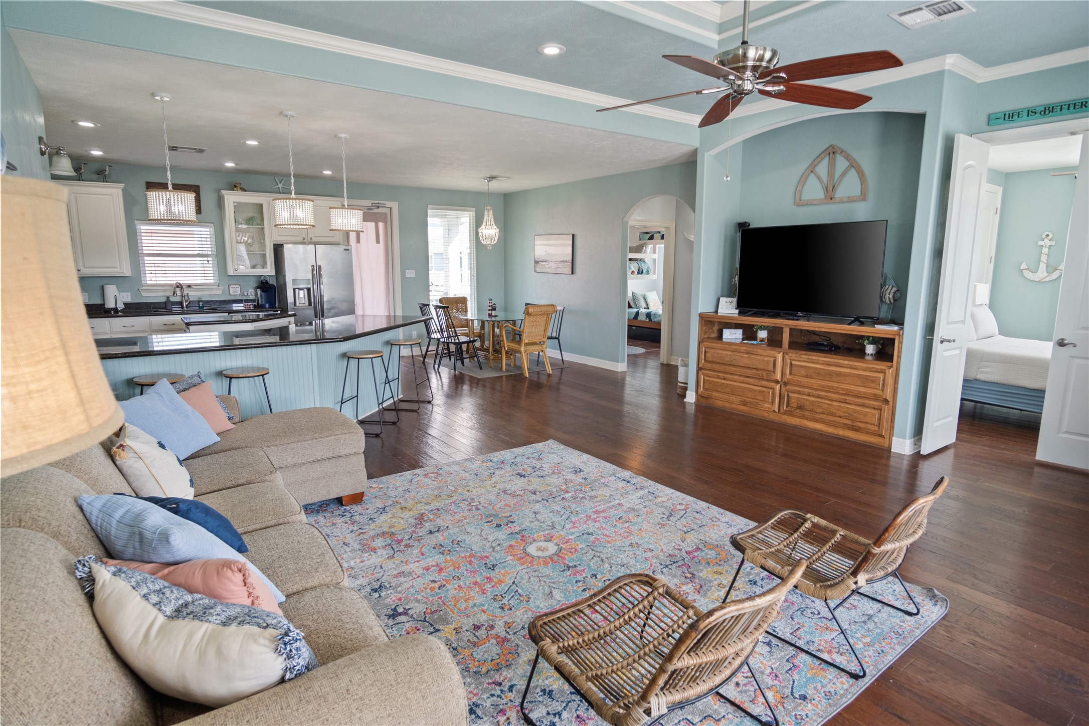 932 Kent Crystal Beach, TX 77650 - Photo 3 of 37 a living room with furniture and a flat screen tv
