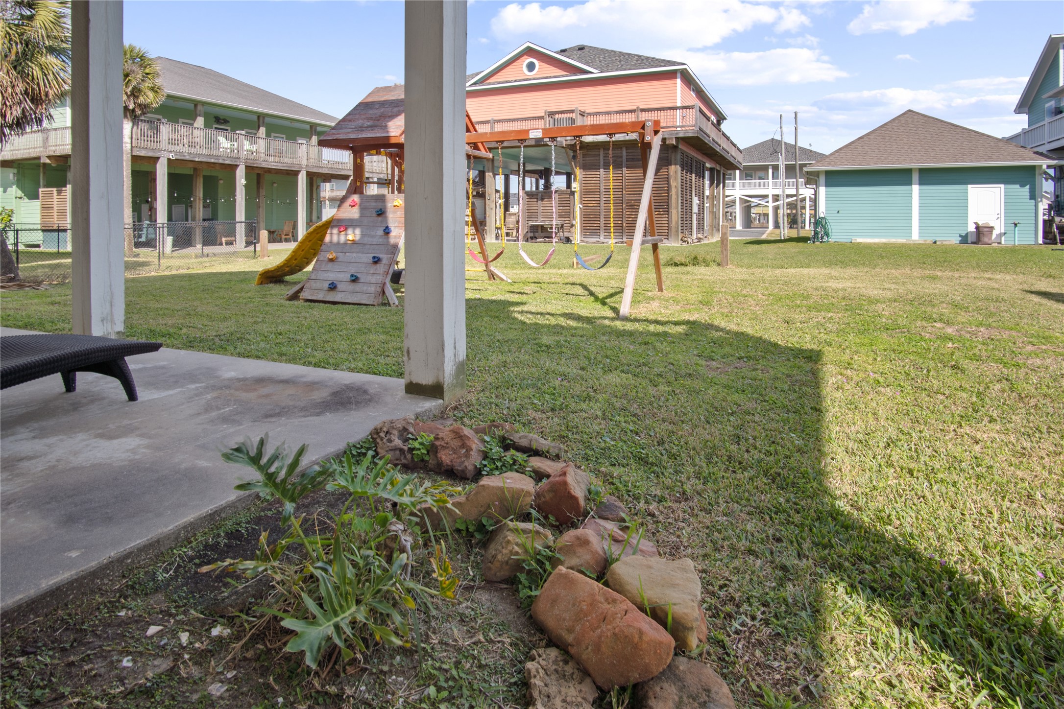932 Kent Crystal Beach, TX 77650 - Photo 36 of 37 a view of a house with a yard