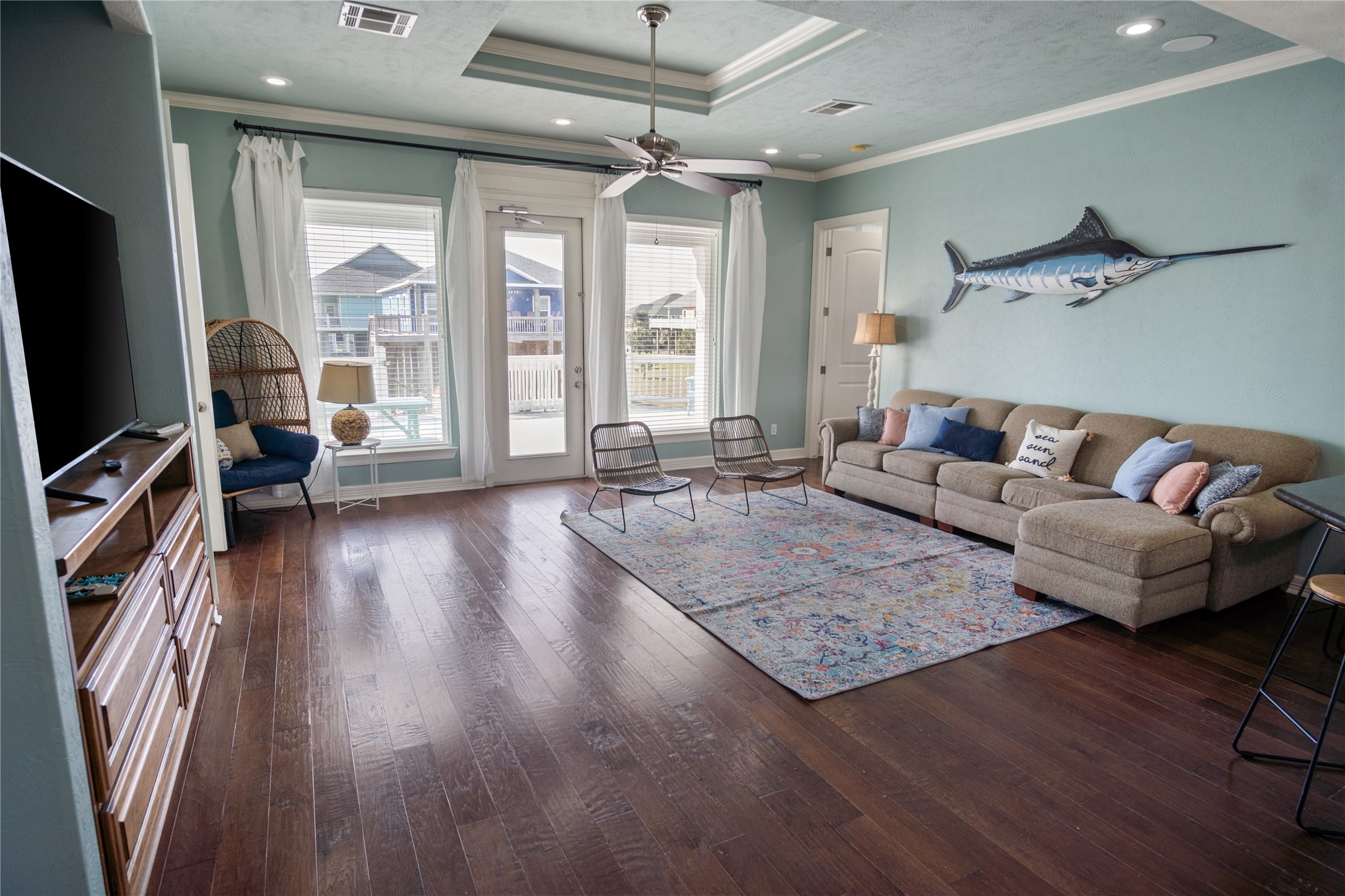 932 Kent Crystal Beach, TX 77650 - Photo 4 of 37 a living room with furniture and a flat screen tv