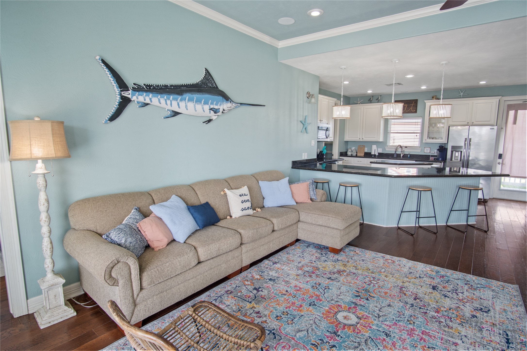 932 Kent Crystal Beach, TX 77650 - Photo 5 of 37 a living room with furniture and a wooden floor