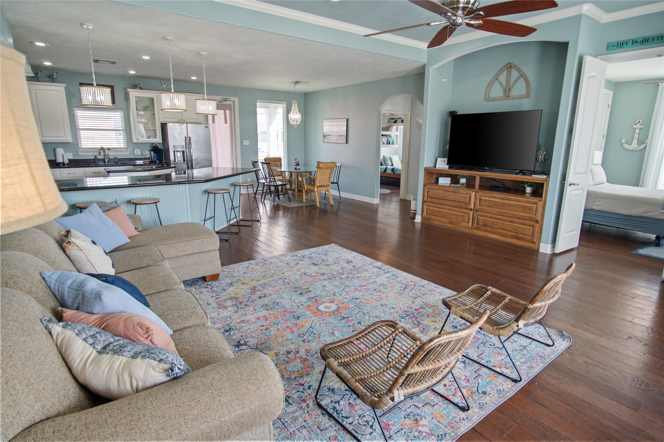 932 Kent Crystal Beach, TX 77650 - Photo 6 of 37 a living room with furniture and a flat screen tv