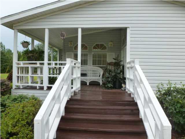 54 Heartland Acres Road Crestview, FL 32539 - Photo 8 of 26 a view of a house with a large window