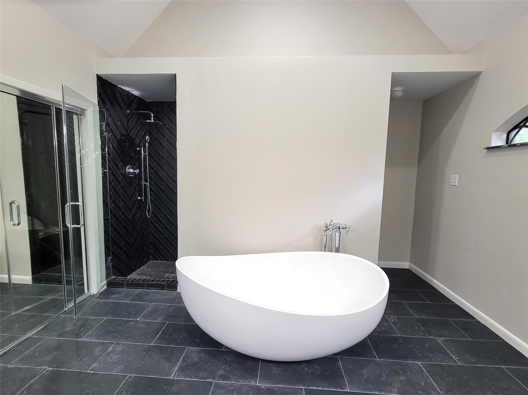 10 Dovewood Place The Woodlands, TX 77381 - Photo 20 of 34 a bathroom with a bathtub and shower