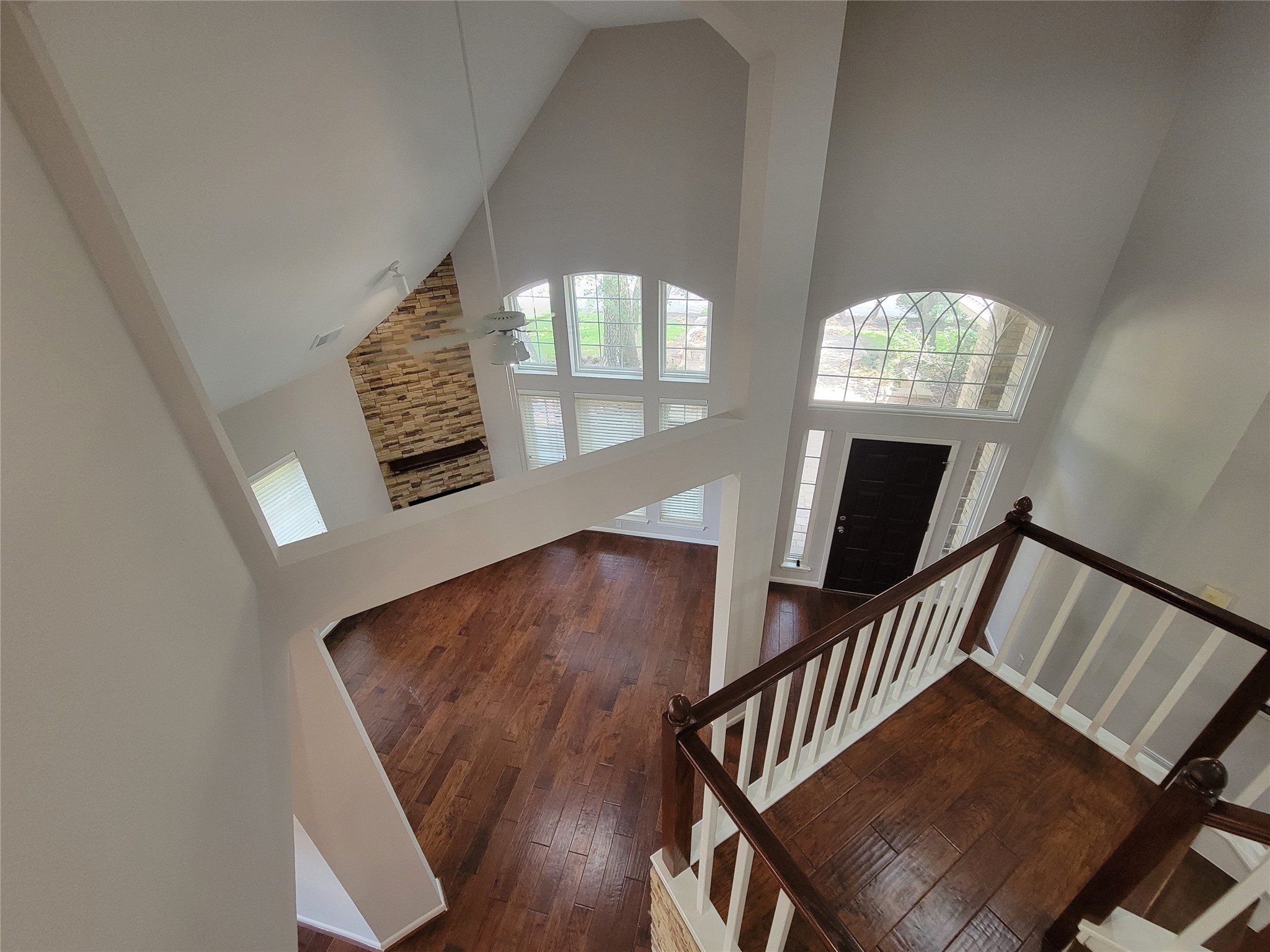 10 Dovewood Place The Woodlands, TX 77381 - Photo 24 of 34 a view of an entryway with wooden floor