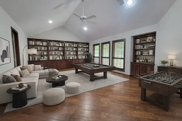 a living room with furniture and a window
