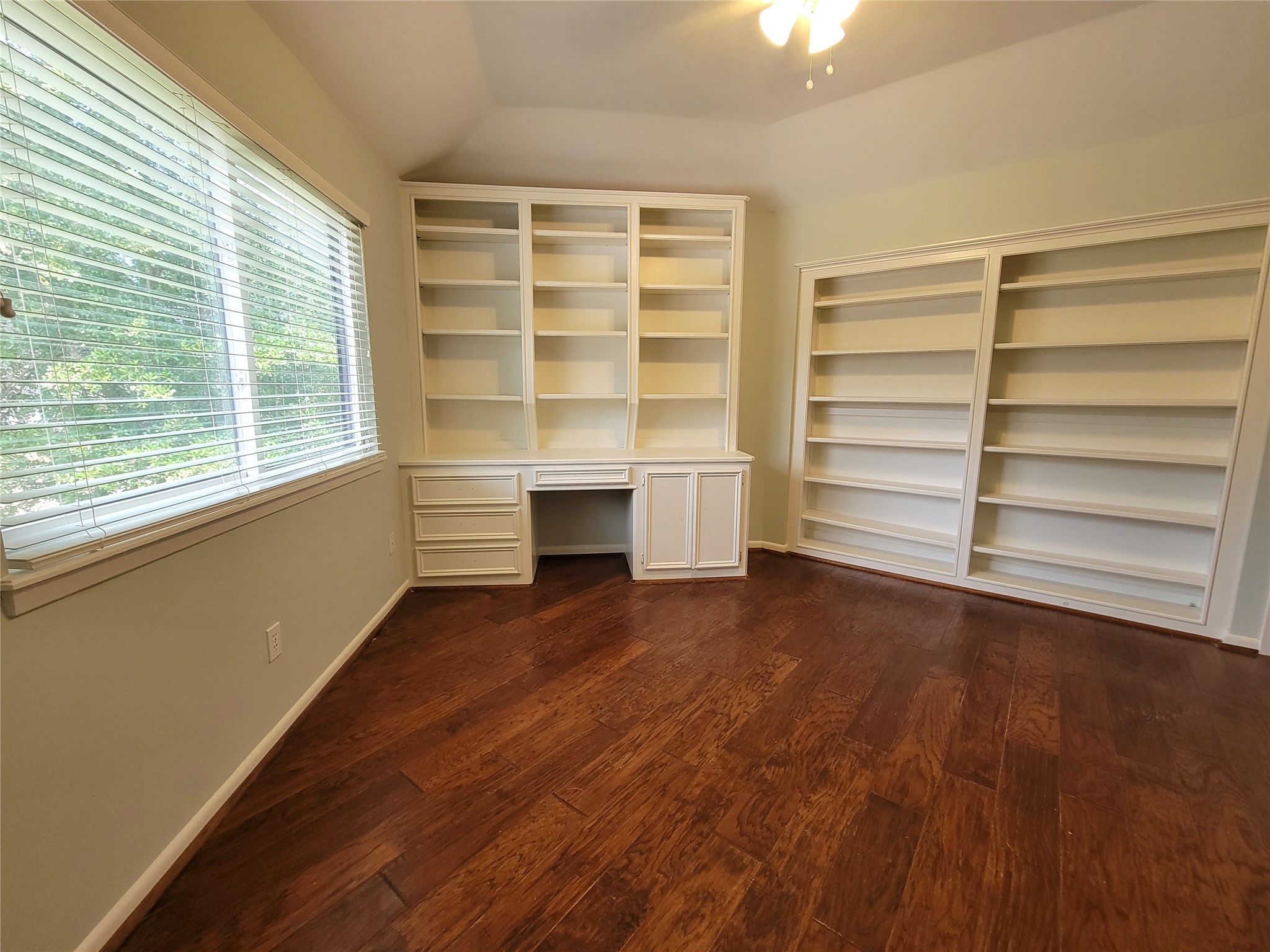 10 Dovewood Place The Woodlands, TX 77381 - Photo 28 of 34 a view of room with empty room and wooden floor