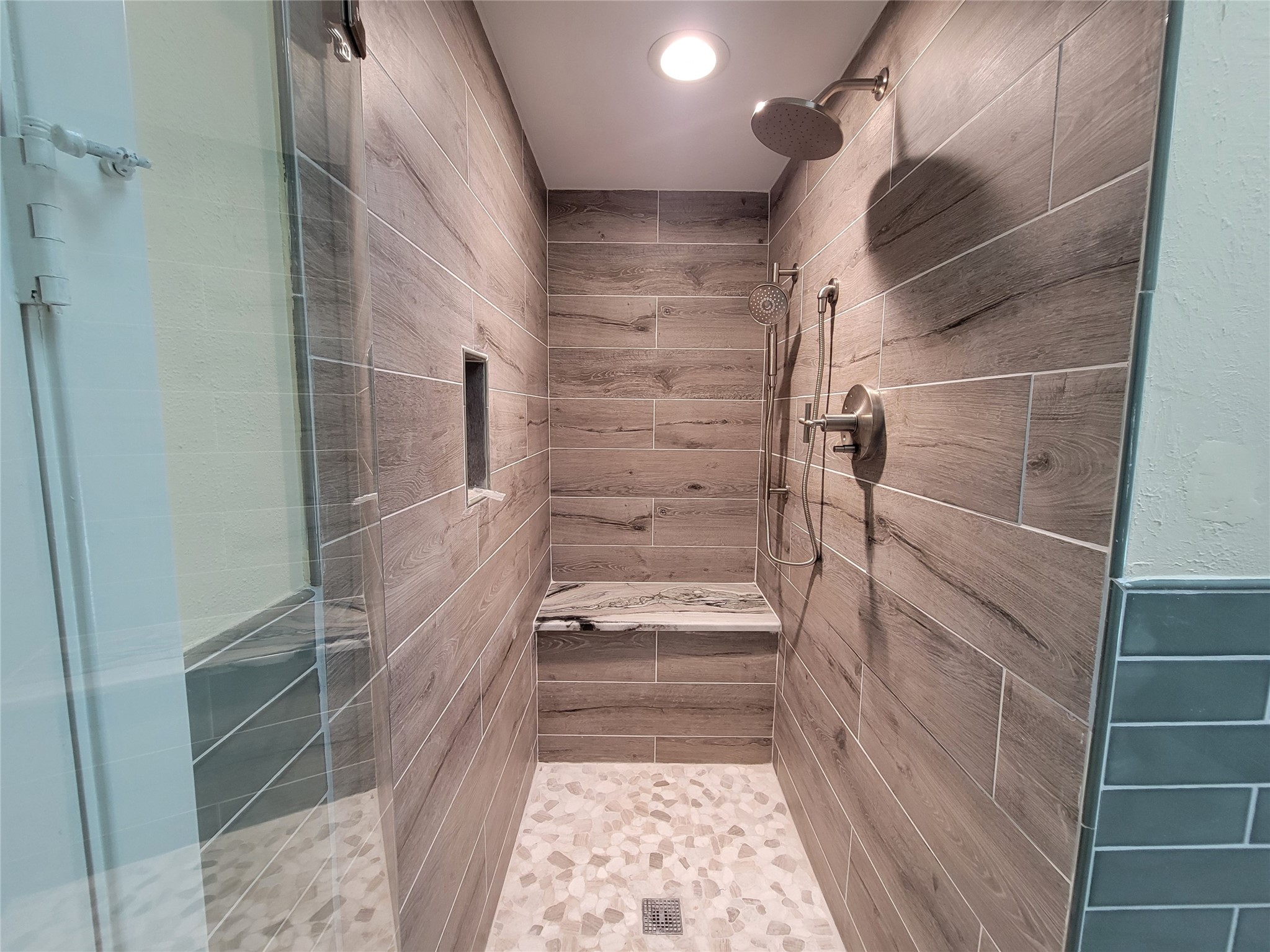 10 Dovewood Place The Woodlands, TX 77381 - Photo 30 of 34 a bathroom with a shower