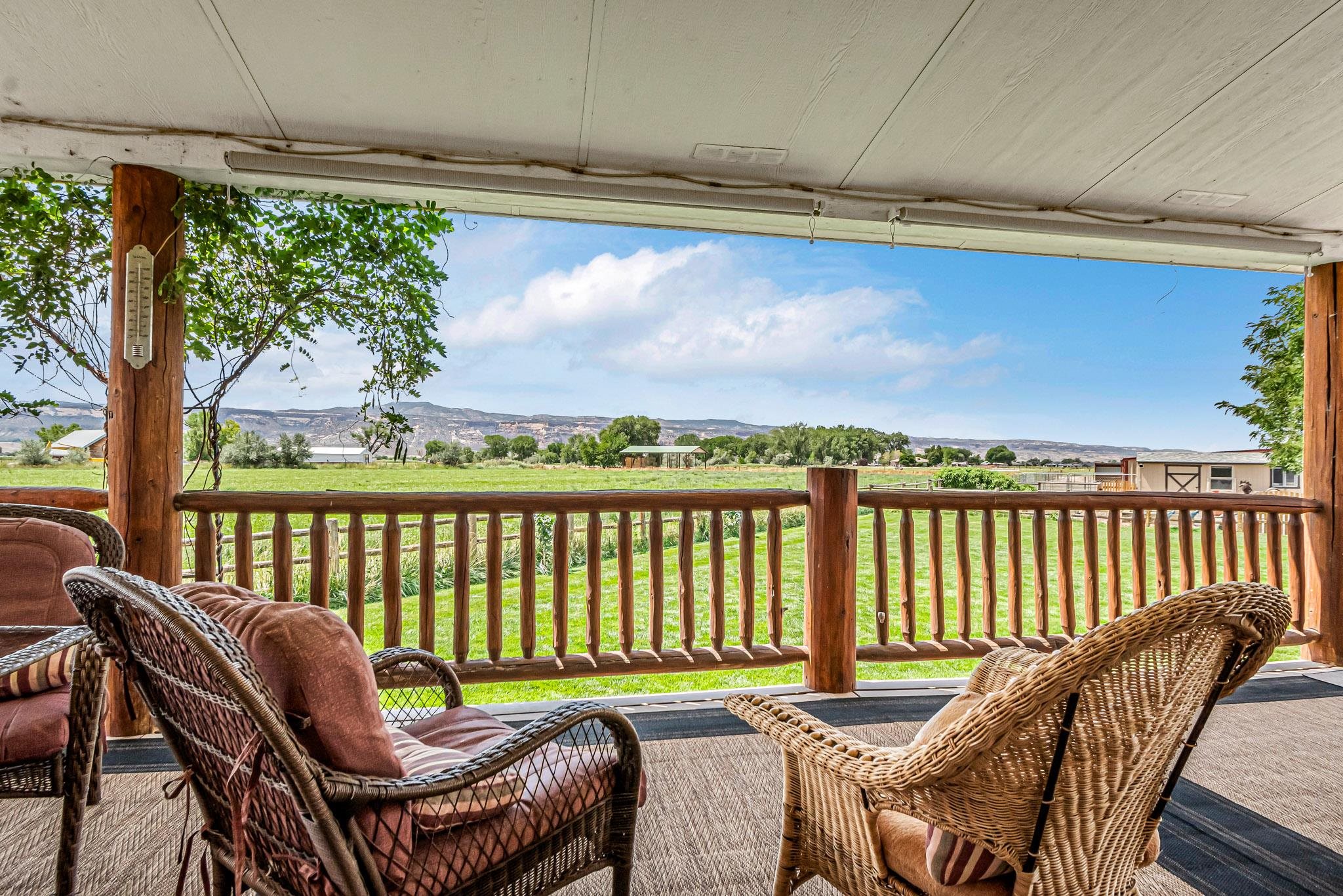985-20 20 1/2 Road Fruita, CO 81521 - Photo 15 of 42 a balcony with table and chairs