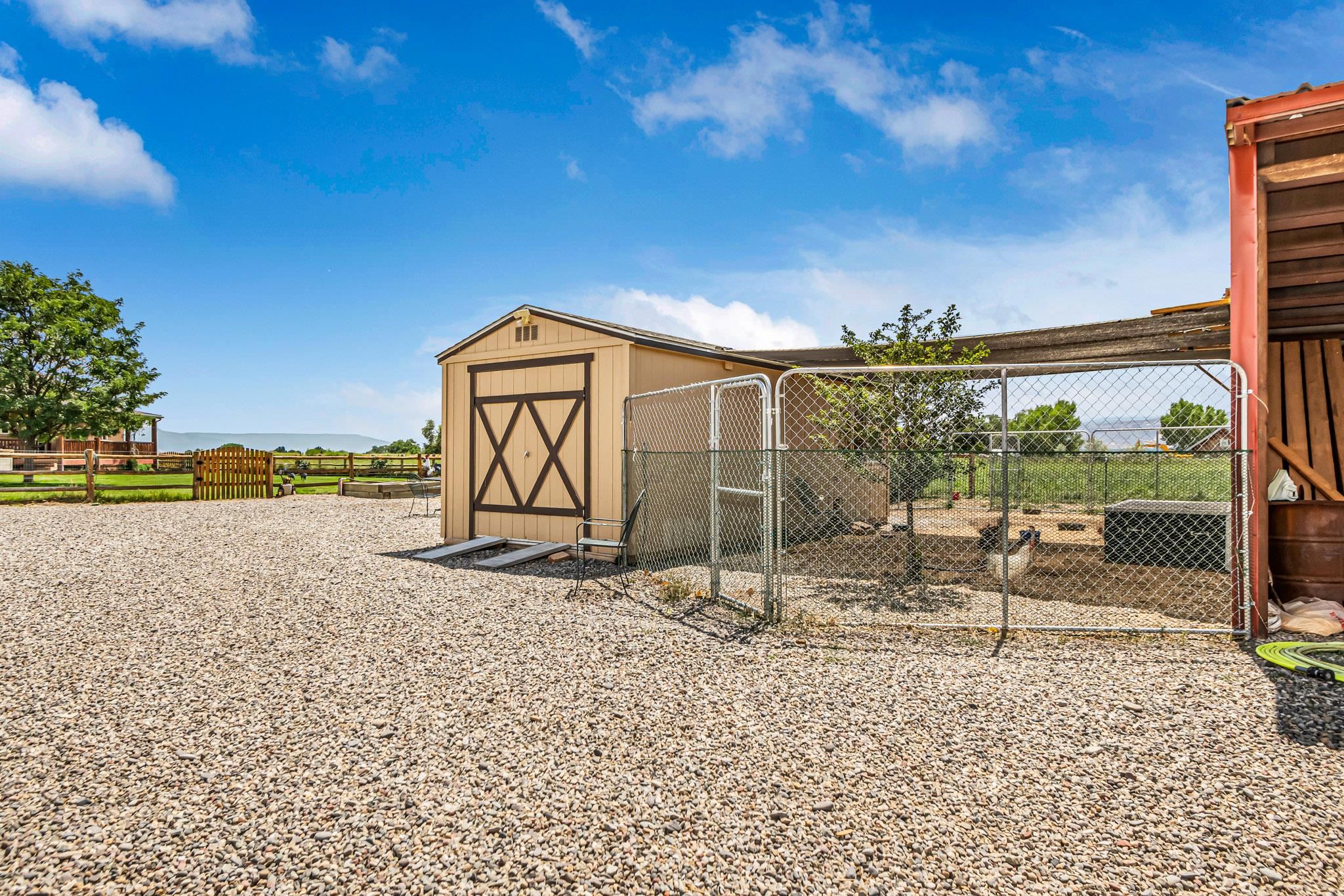 985-20 20 1/2 Road Fruita, CO 81521 - Photo 42 of 42 a backyard of a house with table and chairs