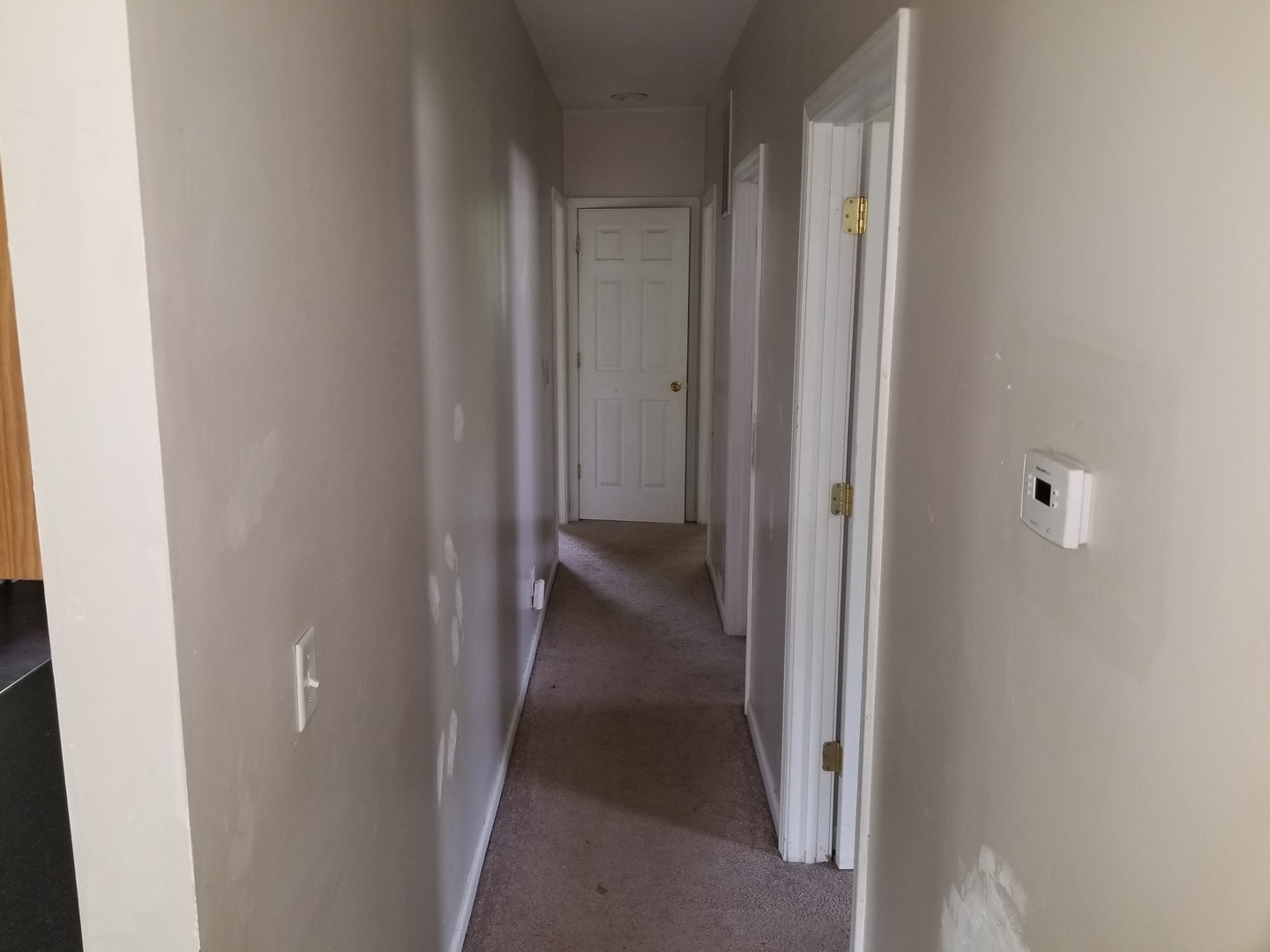 39477 North Hickory Avenue Antioch, IL 60002 - Photo 11 of 25 a view of a livingroom from a hallway