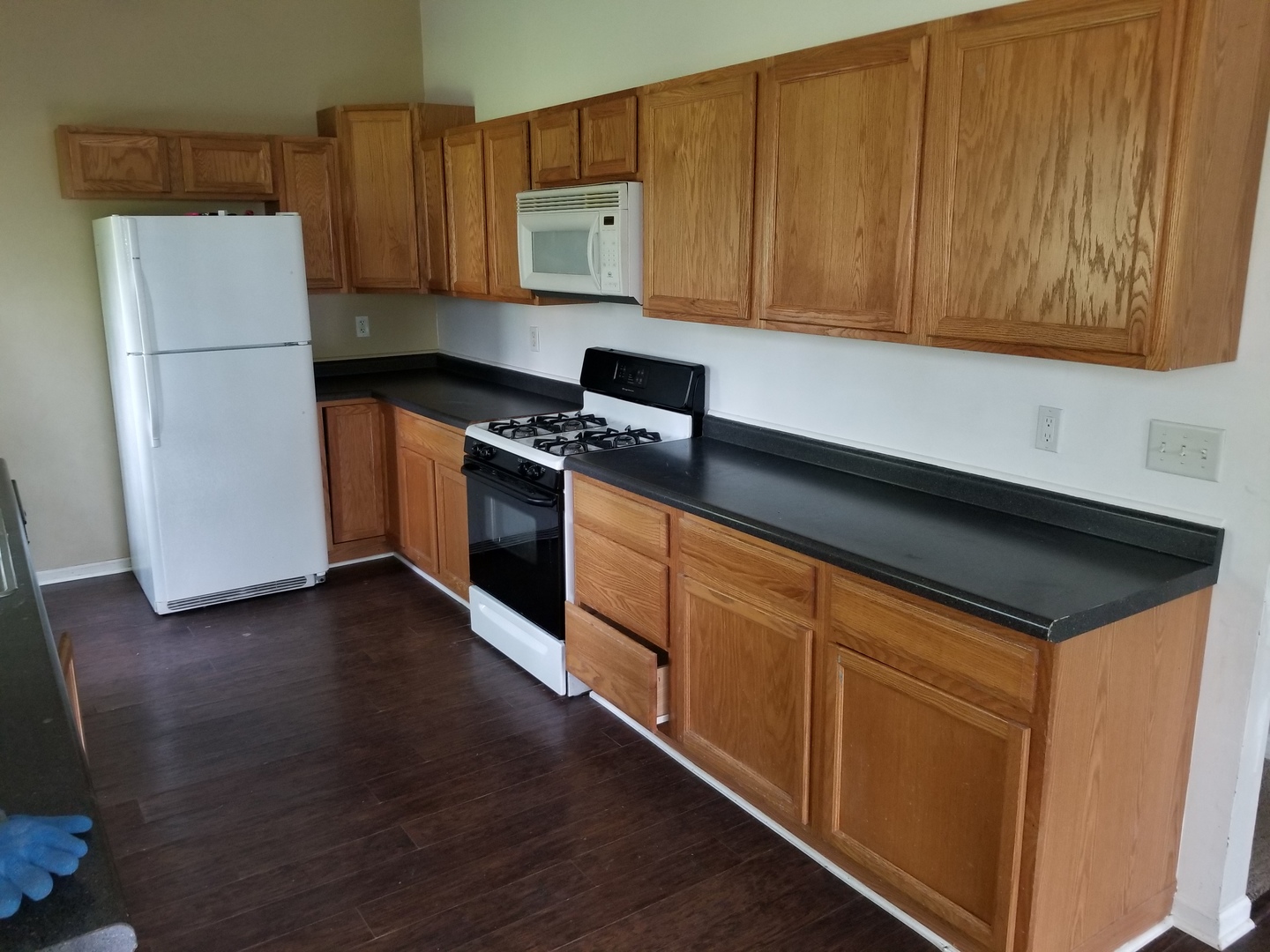 39477 North Hickory Avenue Antioch, IL 60002 - Photo 4 of 25 a kitchen with stainless steel appliances granite countertop a refrigerator and a stove top oven
