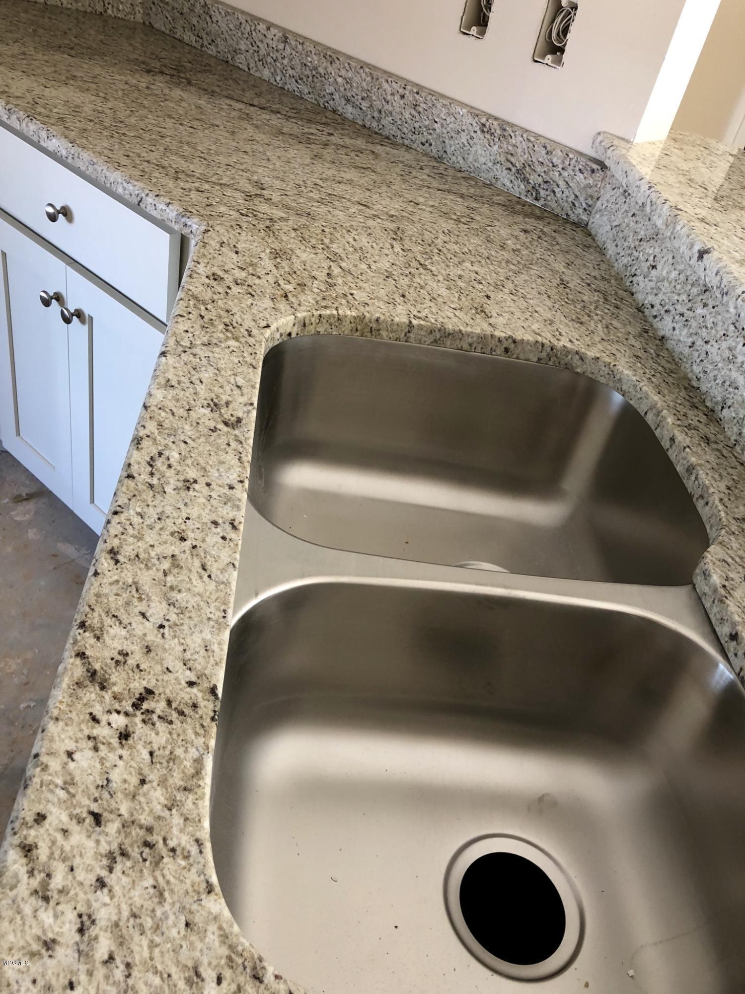 6809 Biddix Evans Road Ocean Springs, MS 39564 - Photo 2 of 12 Granite with under mount 8... sinks