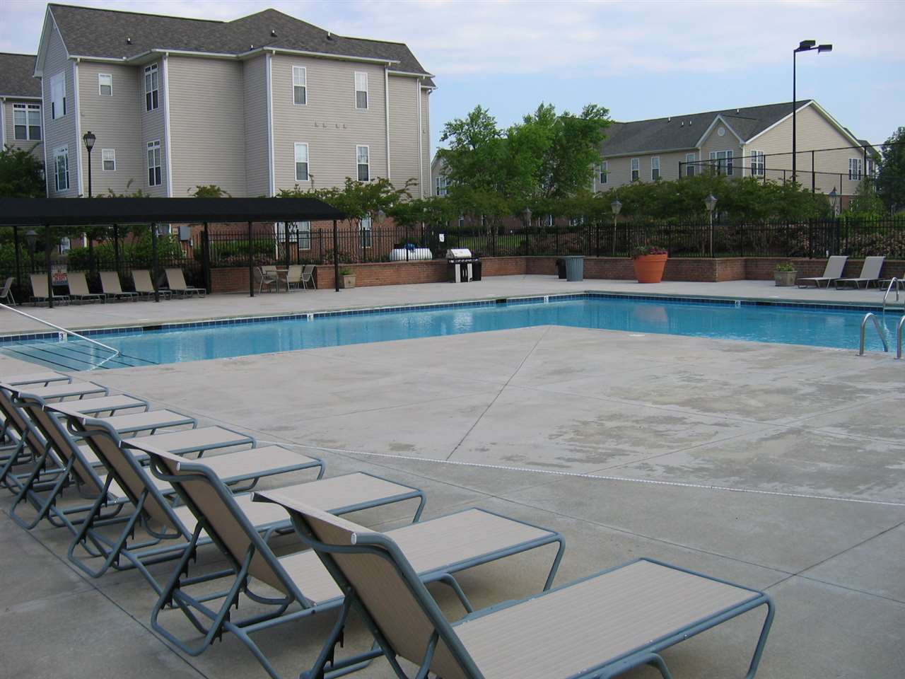 11301 Clubhaven Place, Unit 101 Raleigh, NC 27617 - Photo 12 of 13 Enjoy the private community pool during the summer! Swimming Pool/Hot Tub/Sauna
