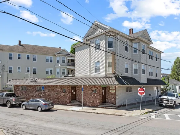 a car parked in front of a building