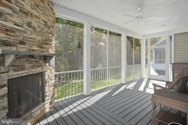 a view of a room with wooden floor and balcony