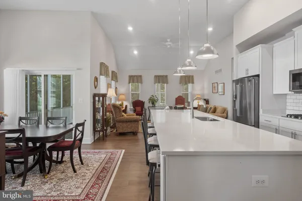 a view of a dining room with furniture