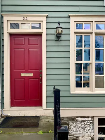 a view of a red door of the house