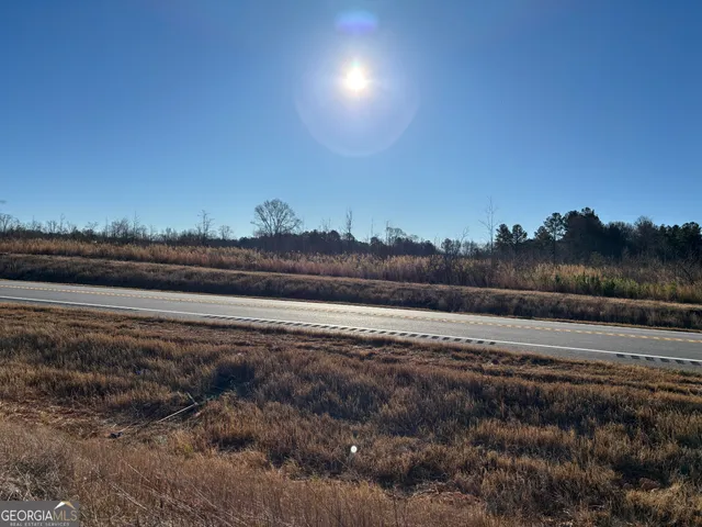 a view of a lake and outdoor space