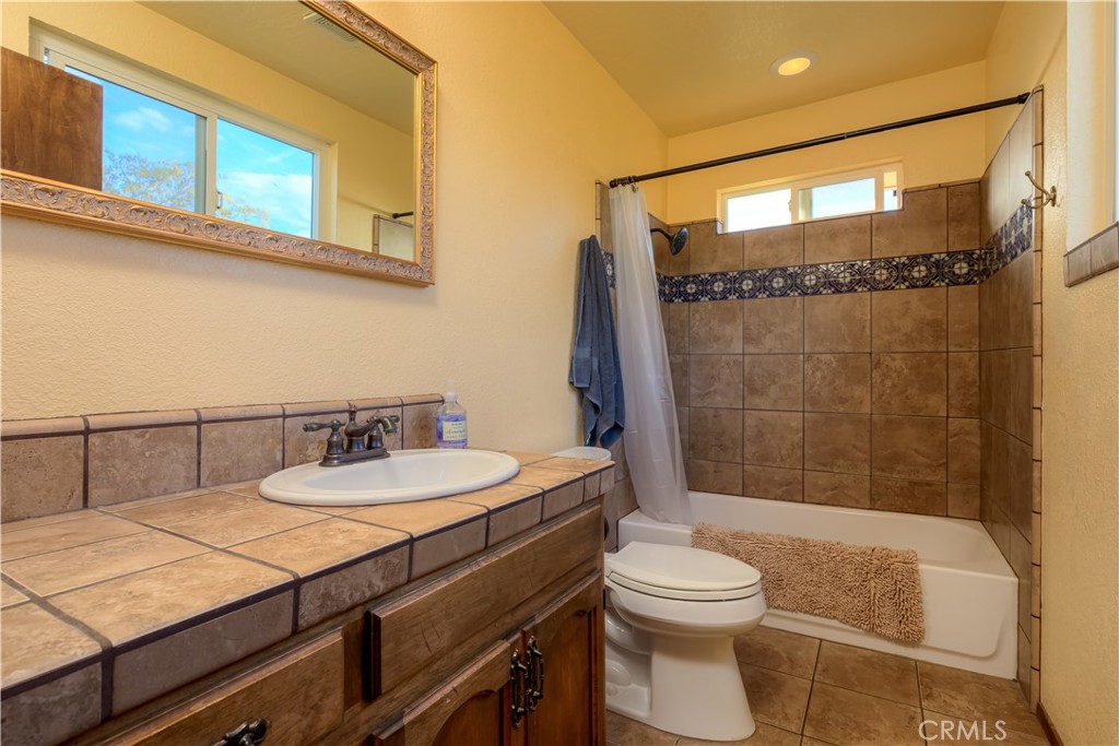 217 Craft Paradise, CA 95969 - Photo 26 of 62 a bathroom with a sink a toilet and shower