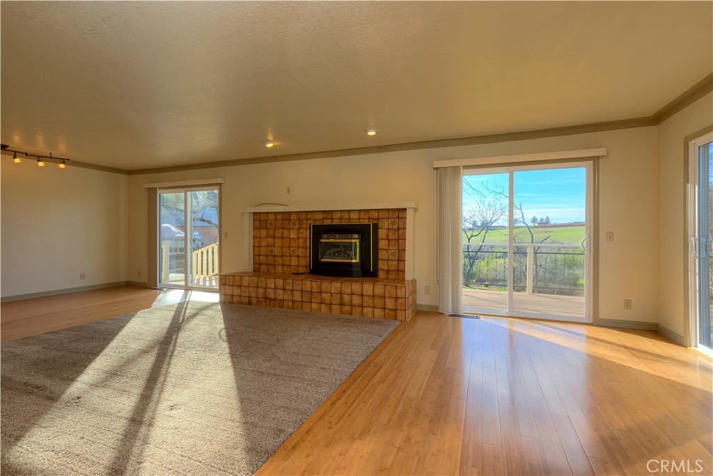 217 Craft Paradise, CA 95969 - Photo 4 of 62 a view of empty room with wooden floor and fan